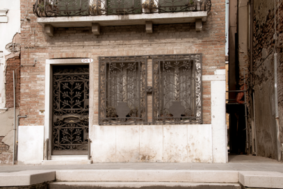 Building with ornate windows and door in brown